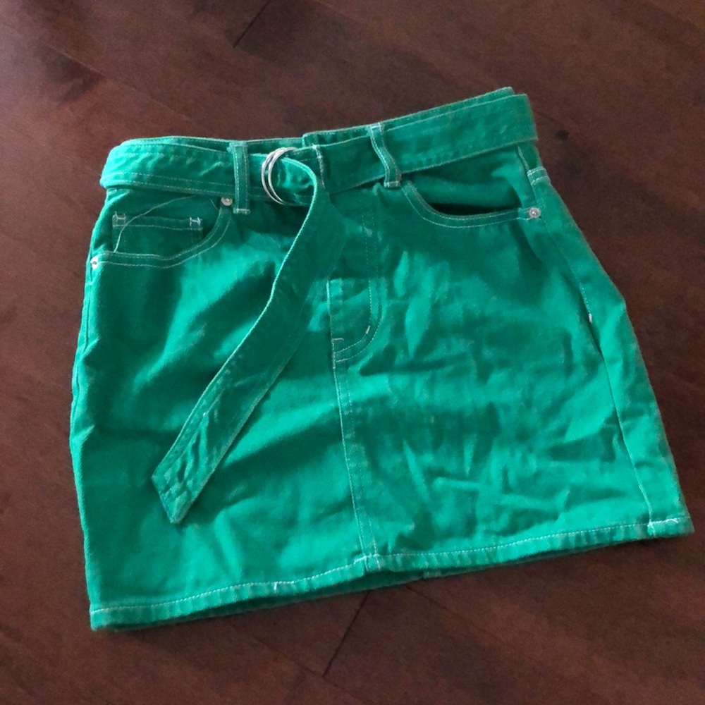 Green belted denim mini skirt
